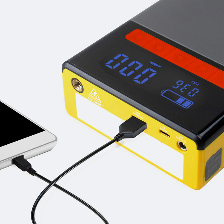 a digital clock is plugged into a charger