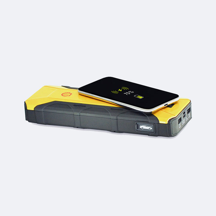 a cell phone sitting on top of a yellow box