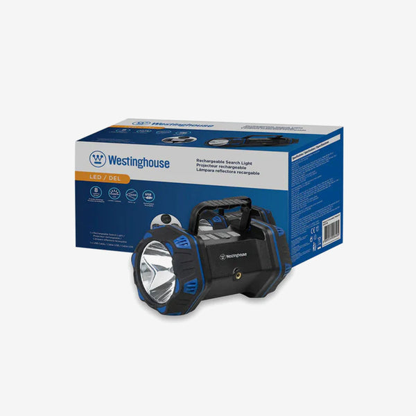 a black and blue flashlight in a box