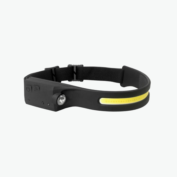 a black bracelet with a yellow light on it