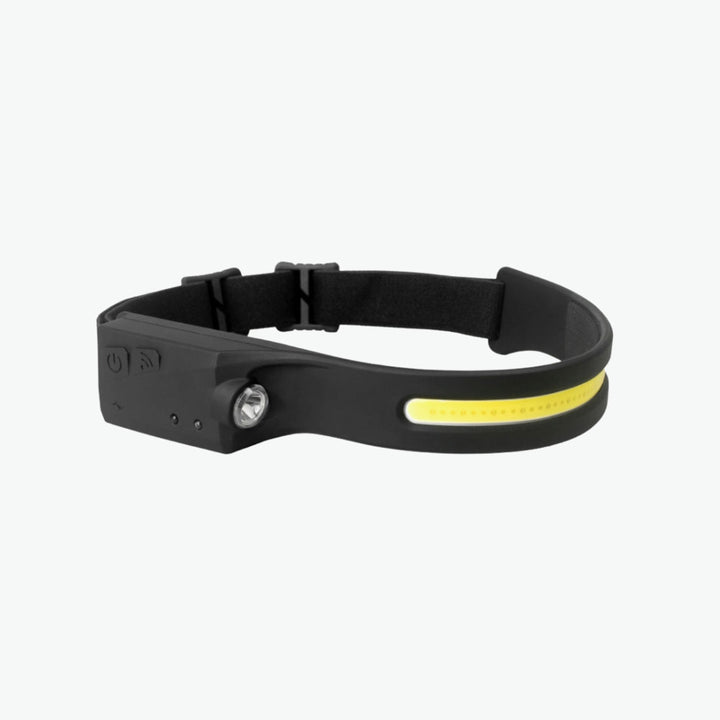 a black bracelet with a yellow light on it