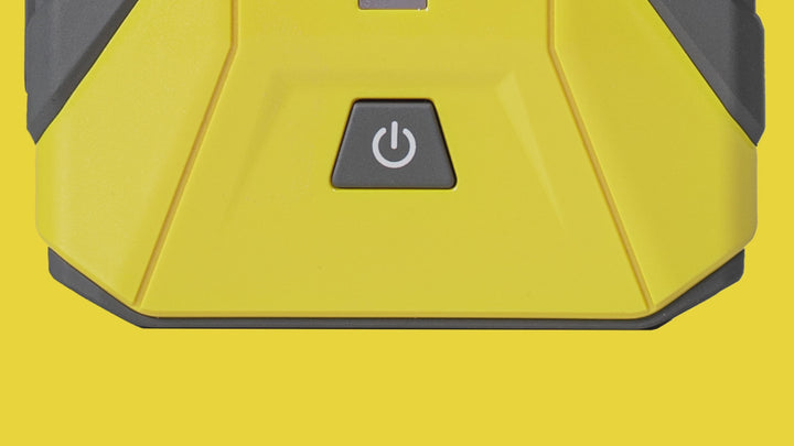 a yellow and gray case with a button on it